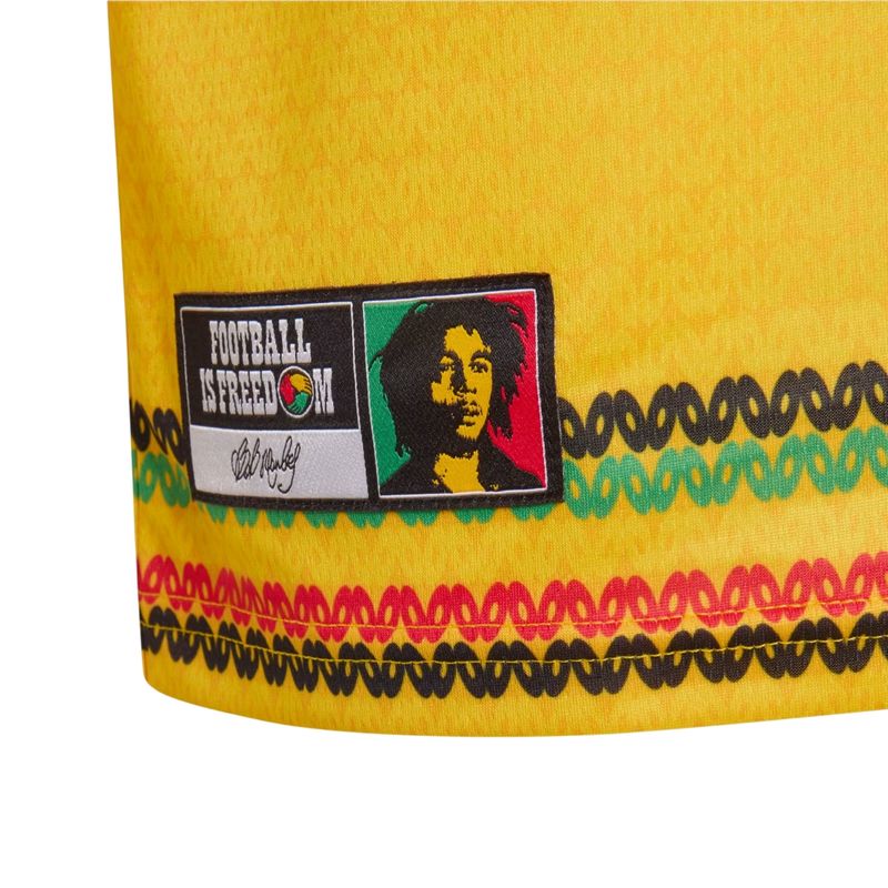 camisa-jamaica-i-26-adidas-bob-marley-infantil-dourada