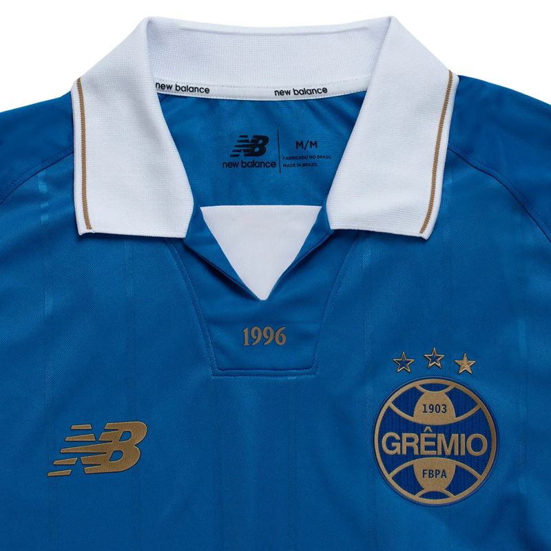 camisa-grêmio-26-27-new-balance-comemorativa-feminina-azul